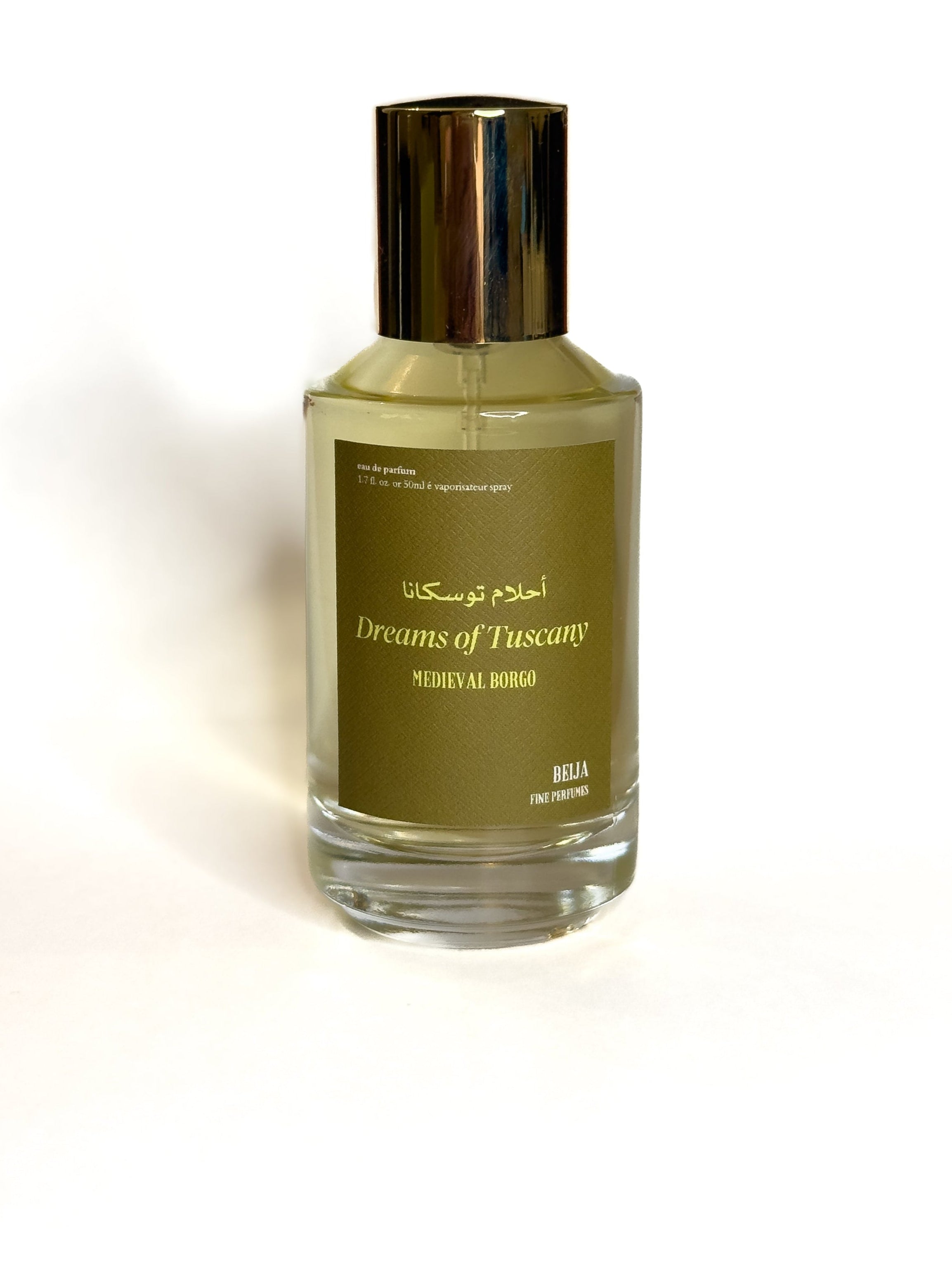 Perfume bottle labeled 'Dreams of Tuscany' on a white background